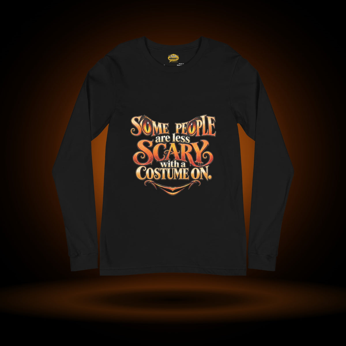 Less Scary in a Costume Halloween long sleeve, black, with an orange glow